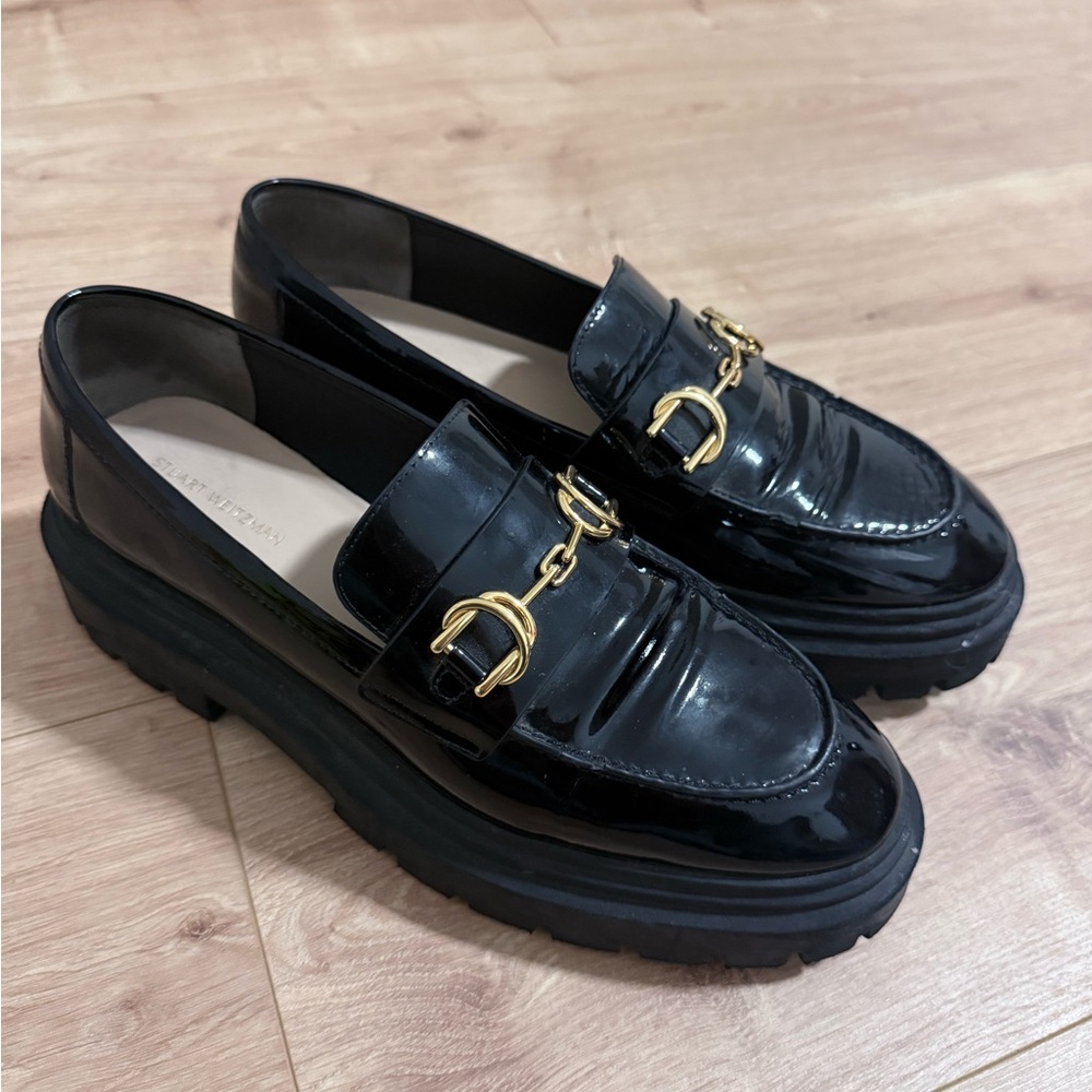 Stuart Weitzman Black Patent Loafers with Gold Accents